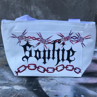 a white tote bag with the word'gophie'painted on it